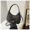 Bolso de mano de nicho de alta gama para mujer, nuevo modelo 2026, bolso de media luna con lazo de estrella, bolso cruzado simple