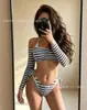 Nuevo Conjunto de Bikini de Rayas Retro para Vacaciones en la Playa, Traje de Baño de Dos Piezas de Manga Larga, Estilo Ins de Nicho, Bikini que Aclara la Piel