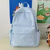 Mochila Nueva y Elegante Estilo Coreano con Alto Atractivo Estético, Adecuada para Niñas, Viajes Casuales, Bolsa Ligera de Doble Hombro con Patrón de Estrellas, Mochila para Estudiantes