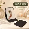 Espejo de maquillaje estilo ins plegable portátil de escritorio para dormitorios de estudiantes