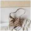 Bolso Tote Minimalista Texturizado de Puntos para el Brazo Otoño Temprano 2026 Nuevo Diseño de Nicho Bolso de Mano Casual con Personalidad Bolso de Hombro