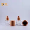 Popular Set de Empaque de Botella de Vidrio para Cosméticos con Bomba Dosificadora 15ml Loción Esencia