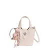 Bolso cubo de cuero suave, moderno y versátil para mujer, fresco y dulce, bolso de hombro cruzado, nuevo bolso de mano estilo coreano 2026 para el trabajo