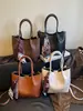 Bolsa tote de grande capacidade, minimalista e única - o novo design da moda de 2026, ostentando um visual estiloso, perfeita para uso casual, trabalho e deslocamento