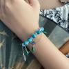 Pulsera de loto estilo chino derivada de bricolaje con la misma impresión de nicho de temperamento de alto valor de belleza pulsera antigua avanzada para novia