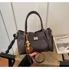 Bolso de cubo casual de moda transfronterizo 2025 otoño e invierno nuevo bolso de hombro con textura retro bolso de mano de personalidad bolso tote