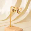 Pendientes de Trébol de Cuatro Hojas Rojo con Goteo de Aceite Vintage Transfronterizos, Pendientes de Anillo C de Cinco Flores Estilo Hong Kong Lujo Ligero Gama Alta Nicho Temperamento
