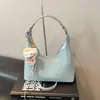 Bolso bandolera de gran capacidad de alta gama para mujer para primavera y verano, nuevo modelo 2026, bolso blanco con cremallera en forma de dumpling para debajo del brazo