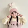 Nuevo gorro de lana tejido de niña para otoño e invierno, gorro infantil para niños y niñas, engrosado y cálido, gorro con protección para las orejas de bebé