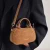 Versión Coreana Bolsa de Bolos Portátil de Nicho para Mujer 2025 Invierno Nueva Moda Tendencia Bolso de Hombro Bolso Cruzado para Viaje
