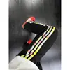 Pantalones Deportivos de Chándal Rectos con Estampado Floral Blanco y Gris para Hombre, Pantalones Coloridos de Otoño con Estampado Floral y Tres Rayas, Pantalones Casuales Sueltos de la Calle Alta Americana