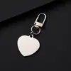 Etiqueta de corte de acero inoxidable más vendida transfronteriza con una pequeña hebilla de puerta, personalizable con grabado, colgante creativo, charm para mochila, pequeño regalo