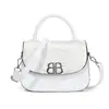 Bolso de mano caja retro de nicho para mujer 2026 simple nueva moda de alta gama bandolera pequeña cuadrada