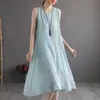 Nuevo vestido de playa de algodón y lino para vacaciones de verano 2026 para mujer, vestido largo que te hace ver más alta y delgada, esconde la grasa corporal, talla grande