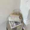 Bolso de concha moderno y versátil para mujer, nuevo modelo 2026, bolso de noche para Cheongsam, bolso con clip, bolso cruzado de un solo hombro para mujer