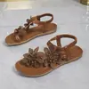 Sandalias planas transfronterizas para mujer de talla grande, estilo bohemio de verano con decoraciones florales, chanclas casuales de playa con tira elástica para el dedo del pie