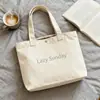 Bolsa de Lona Minimalista Estilo Inglés Personalizada de Gran Capacidad, Versátil para Uso Diario, Bolso de Mano de Lona, Bolso de Hombro de Color Sólido, Diseño de Nicho