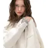 Suéter de punto retro blanco de alta gama de imitación de dos piezas para mujer, nuevo estilo otoño e invierno, suéter casual suelto suave