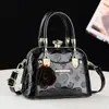 Fabricante de bolso bandolera con hombro repujado de pinza de acero, bolso de mano de moda versátil popular para mujer de comercio exterior, nueva versión coreana 2026