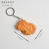 PVC Simulación Comida Piernas de Pollo Frito Alitas de Pollo Papas Fritas Flor de Arroz de Pollo Llavero Colgante Modelo de Comida Frita Falsa Venta al por Mayor