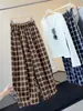 Pantalones de pierna ancha a cuadros retro para mujer, nuevo estilo otoño 2026, adelgazantes, holgados, casuales, versátiles, pantalones casuales de nueve puntos