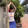 2026 Nueva Camiseta Corta Estilo Coreano con Estampado Floral para Mujer, Versátil de Verano Cuello Redondo Hombro Normal Manga Corta Top Blanco Ins