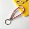 Llavero creativo llavero de cuerda de cuero cordón para llaves colgante de joyería cordón tejido fábrica de cuerda de cuero venta al por mayor