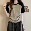 Camiseta Regular de Ombro a Ombro Transfronteiriça Manga Curta Feminina 2026 Novo Verão Emagrecedora Coreana Color-Blocking Raglan Linha A Retrô Americana Top Curto