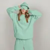 Moletom Casual Soltinho Feminino Europeu e Americano Outono e Inverno Novo Versátil Casual Simples Cor Lisa Máscara para Olhos Moletom de Manga Longa