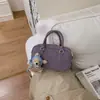 Bolsa de Moda Cotidiana Transfronteiriça para Mulheres 2026 Nova Bolsa de Mão Simples Bolsa de Ombro Versátil para o Dia a Dia Bolsa Pequena Quadrada Transversal