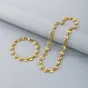 Pulseira minimalista e sofisticada de aço inoxidável com design de focinho de porco de grão de café, banhada a ouro 18K