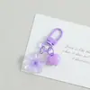 Colgante de Flor de Cerezo con Purpurina Fina de Colores Llavero Pequeño Fresco Decoración para Bolsos Joyería DIY Colgante de Regalo Venta al por Mayor