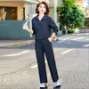 Traje casual de moda de otoño para madres de mediana edad y mayores, nuevo conjunto elegante de dos piezas que reduce la edad con una sudadera de cuello vuelto, ropa elegante para mujer