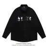 Camisa de Solapa Bordada de Gato Estilo Retro Americano de Manga Larga para Hombres y Mujeres Primavera y Otoño 2026 Camisa Suelta de Pana Estilo Hong Kong