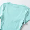 Atacado de Roupas Femininas Transfronteiriças Verão 2026 Novo Estilo Estilo Puro Desejo Versátil Manga Curta Ombro Direito Camiseta Slim Fit Gola U Cropped