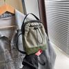 Bolsa Transversal Niche Sports Bolsa Casual Pequena Street Masculino e Feminino Simples 2025 Tendência Primavera Bolsa Balde de Ombro
