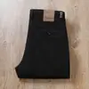 Estación Europea Otoño e Invierno Pantalones Cálidos Gruesos con Forro de Polar Elásticos para Hombre Grises de Negocios Engrosados Rectos Casuales