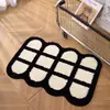 Alfombrilla de felpa minimalista en blanco y negro para la entrada del baño, absorbente de agua, antideslizante, engrosada, alfombra felpuda y suave