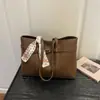 Bolso de cesta de nicho transfronterizo, bolso de mano, bolso tipo cubo para mujer, bolso de hombro para el trabajo, bolso tote cruzado de gran capacidad