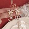 Pendientes de Mariposa y Perla Europeos y Americanos de Nuevo Producto Transfronterizos, Pendientes de Borla con Diseño de Lujo Ligero, Pendientes Directos del Fabricante