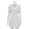 Elegante Vestido Corto de Línea A Estampado Estilo Francés para Mujer 2026 Nuevo Transfronterizo Cuello en V Manga Corta Cintura Alta Floral