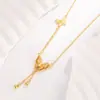 Nuevo Collar Retro de Borla Doble Capa Mariposa Estilo Chino, Diseño de Nicho de Alta Gama, Joyería de Cadena para Clavícula Moderna y Exquisita