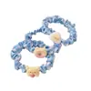 Leite amarelo urso intestino grosso anel de cabelo acessórios para o cabelo coração da menina doce vento corda de cabelo estudantes de alta elasticidade rabo de cavalo elástico elástico atacado