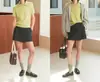 Suéter pulôver de manga curta com gola pequena, moda casual versátil, suéter irregular