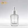 Botella de Aceite Esencial de Venta Caliente Botella de Vidrio Empaque Botella Cuadrada Pequeña 30ml, Gotero de Caucho de Nitrilo, En Stock