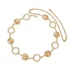 Cadena de cintura dorada tipo disco estilo vacacional transfronteriza, un cinturón de metal de estilo étnico de moda para llevar con vestidos