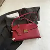 Bolso de mujer de alta gama 2026 verano nuevo bolso de hombro para el trabajo, bolso de hombro cruzado de diseño de nicho moderno y simple
