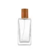Frasco de Spray de Perfume com Tampa de Grão de Madeira Personalizada 50ml Frasco de Vidro Quadrado para Perfume Frasco Cosmético Portátil