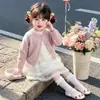 Conjunto de vestido de tul con lazo para niña de comercio exterior y cárdigan, nuevo conjunto de dos piezas de estilo coreano moderno para otoño de 2026, ropa para niños al por mayor