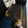 Calça de Moletom Estampada com Estrelas por Toda Parte Estilo Retro Americano Masculina Outono Design Retro Americano Calças Esportivas Retas Casuais